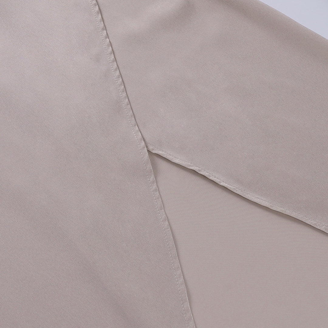 Détail de la robe midi femme Cléa, matière fluide pour un confort élégant.