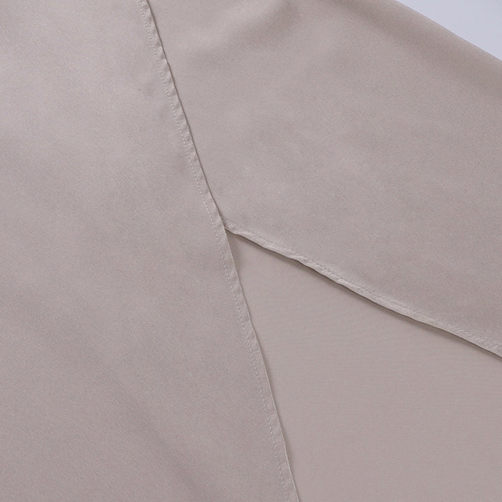 Détail de la robe midi femme Cléa, matière fluide pour un confort élégant.