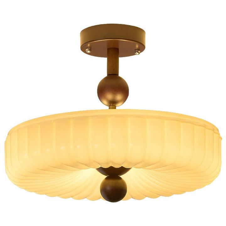 Plafonnier contemporain verre texturé, parfait pour plafond bas. Éclairage ambiant doux toute pièce.
