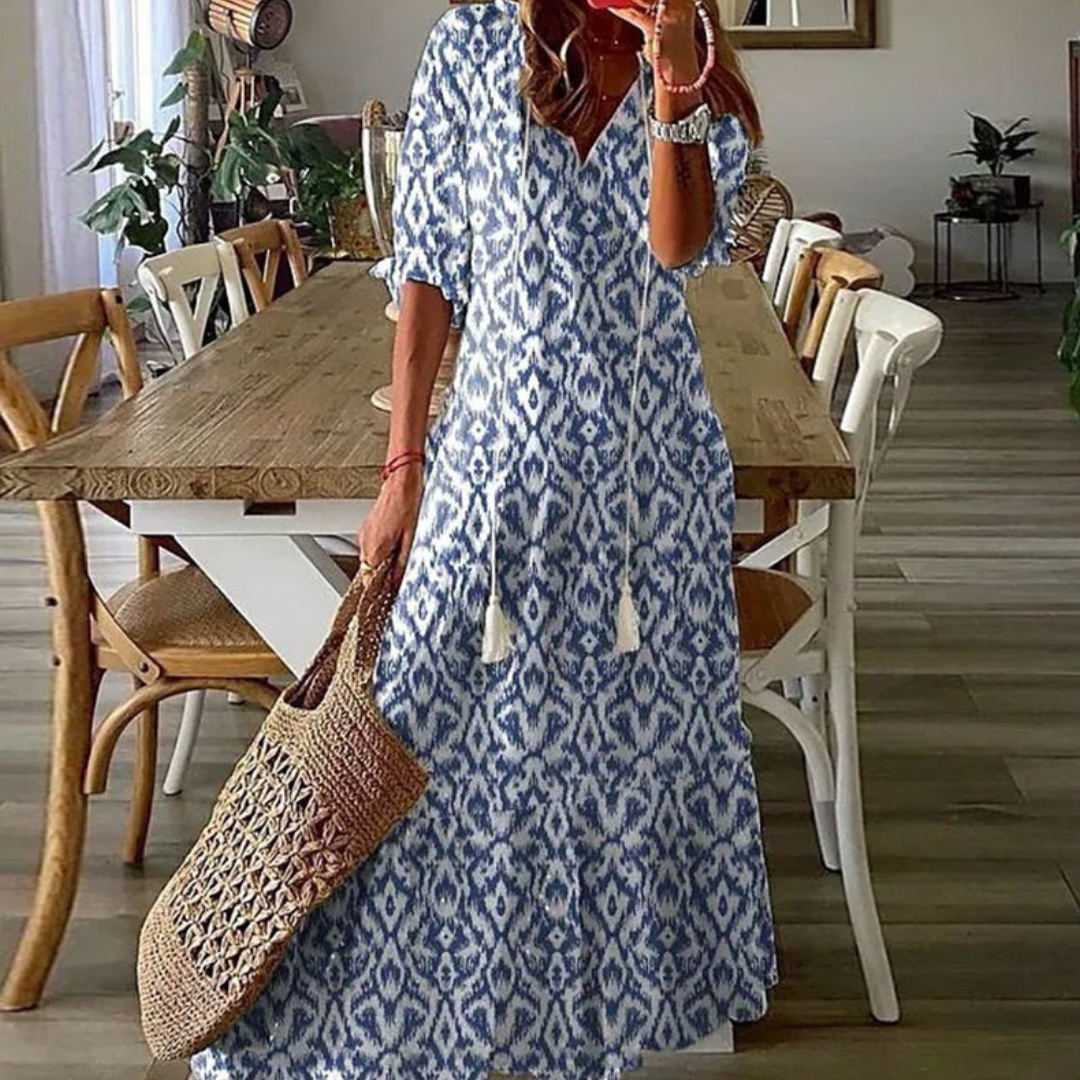Robe d'été bohème fluide pour femme, col V, coupe flatteuse cache-ventre, parfaite pour plage ou vacances.