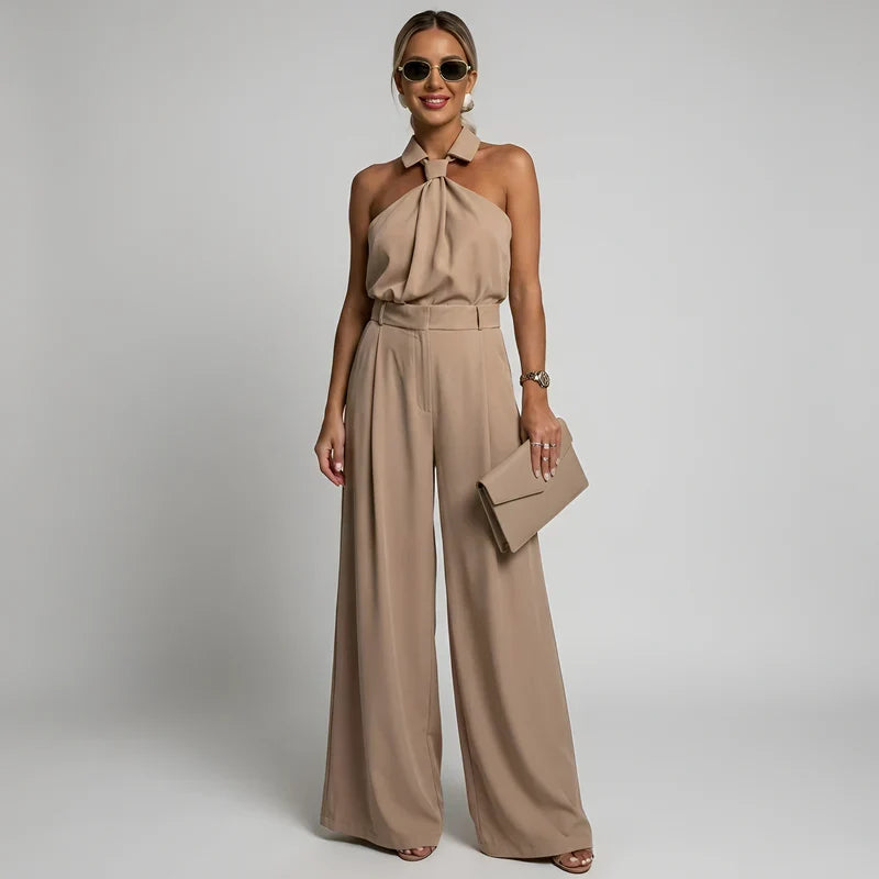 Combinaison pantalon palazzo fluide femme, dos nu élégant pour cérémonie ou soirée chic.