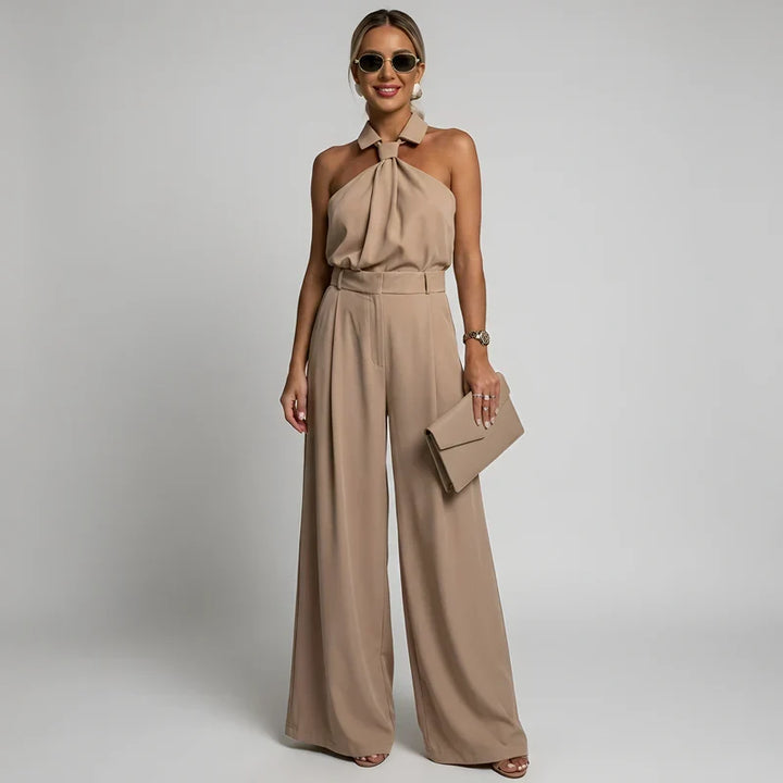 Combinaison pantalon palazzo fluide femme, dos nu élégant pour cérémonie ou soirée chic.