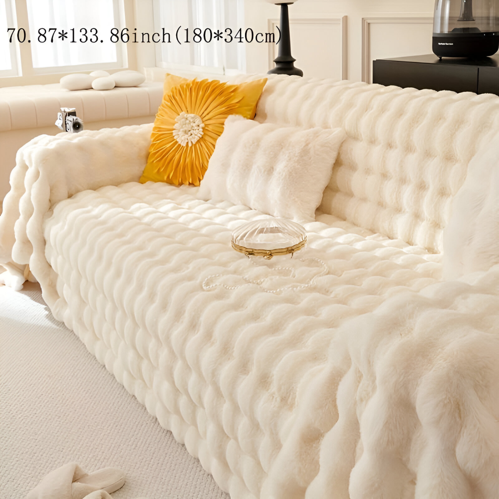 Plaid polaire moelleux pour le lit, apportant une couche supplémentaire de chaleur et de douceur.