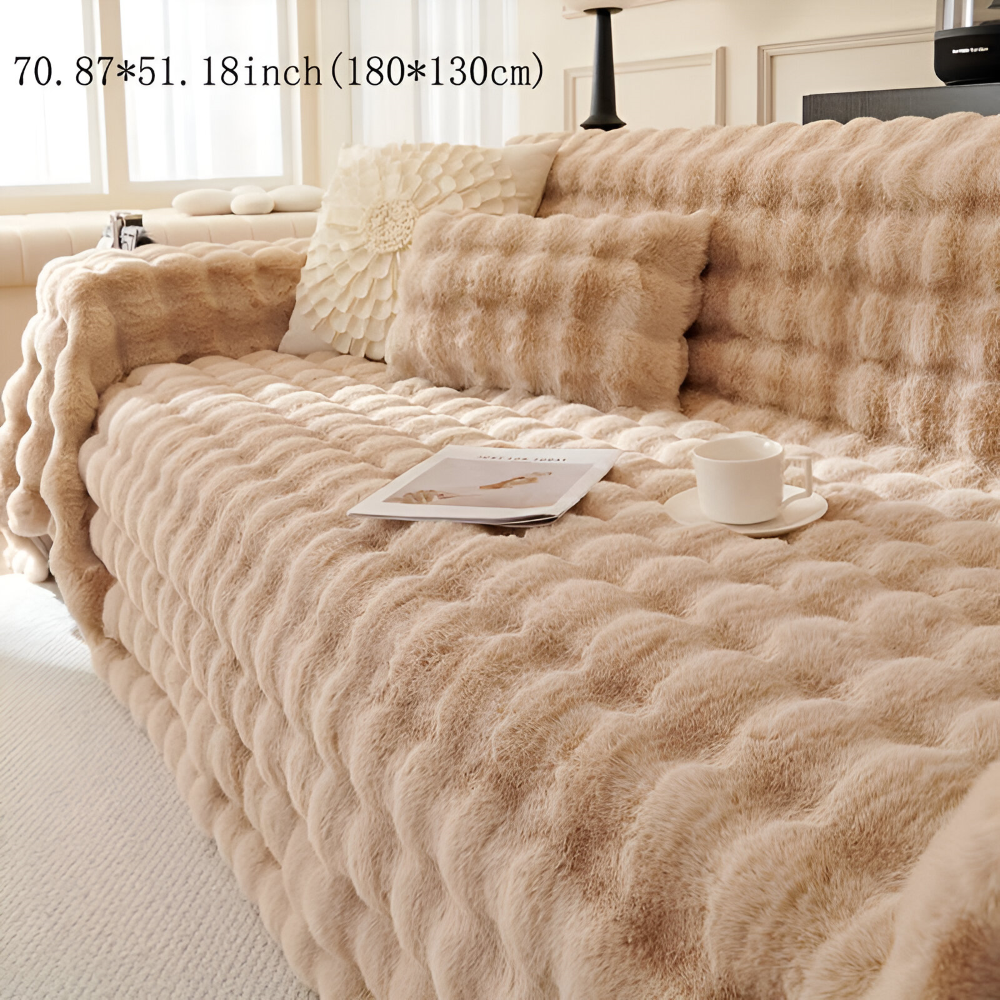 Couverture épaisse en polaire pour des soirées cosy, ajoutant une touche chaleureuse à la maison.