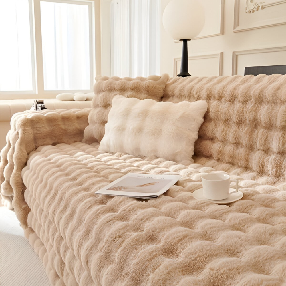 Plaid chaleureux en polaire pour se blottir, apportant confort et style à votre intérieur.