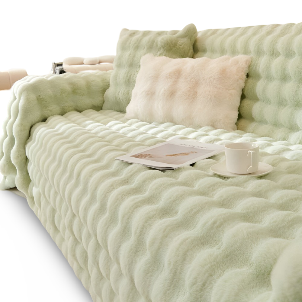 Plaid en polaire épaisse pour canapé, apportant chaleur, douceur et une touche cosy à votre intérieur.