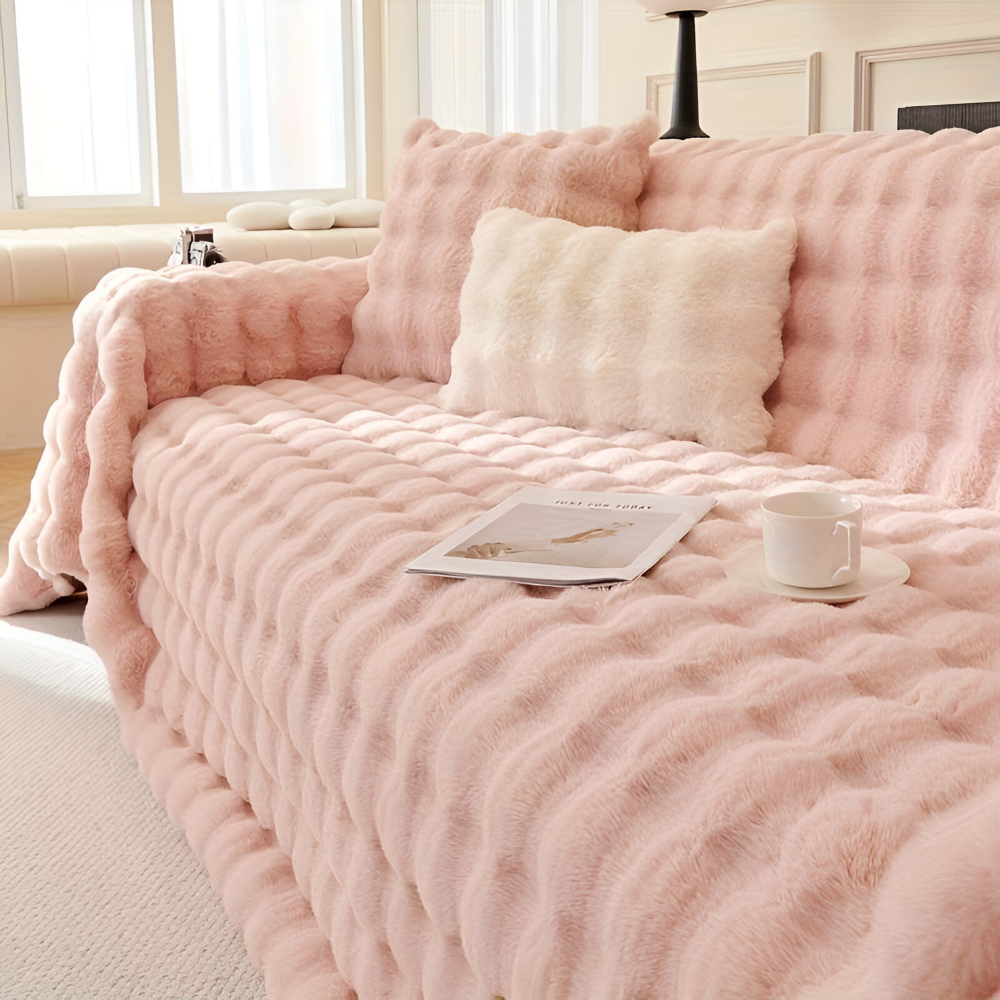 Grande couverture polaire confortable pour canapé, idéale pour des moments de détente à la maison.
