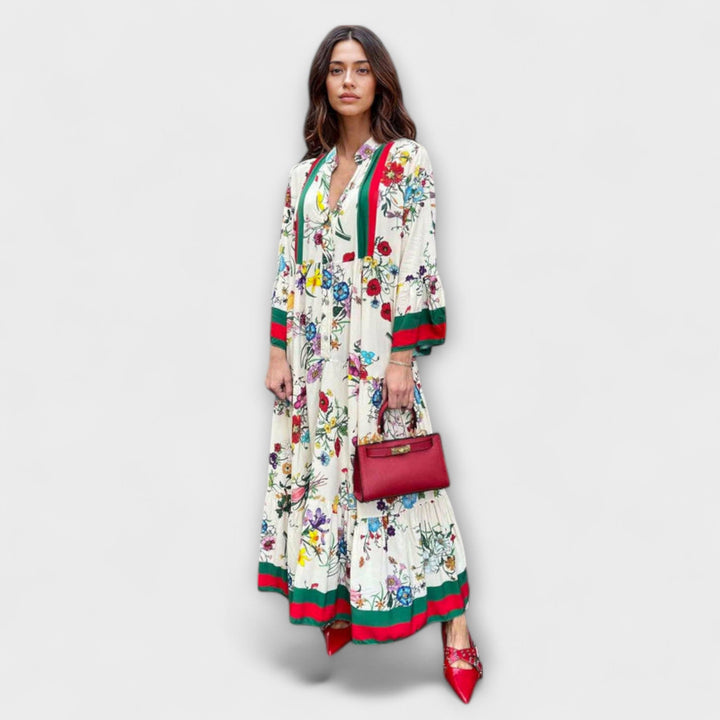Robe maxi fleurie blanche et rouge pour femme, style tropical élégant, idéale été, plage et vacances.