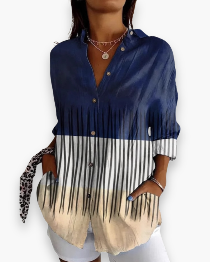 Chemisier femme imprimé avec motifs vifs, un choix chic et moderne pour compléter votre garde-robe estivale.