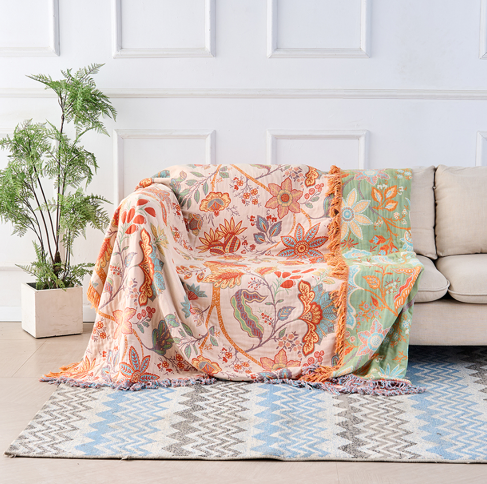 Couverture jeté floral en coton, motifs printemps. Idéal pour un style bohème léger à la maison.