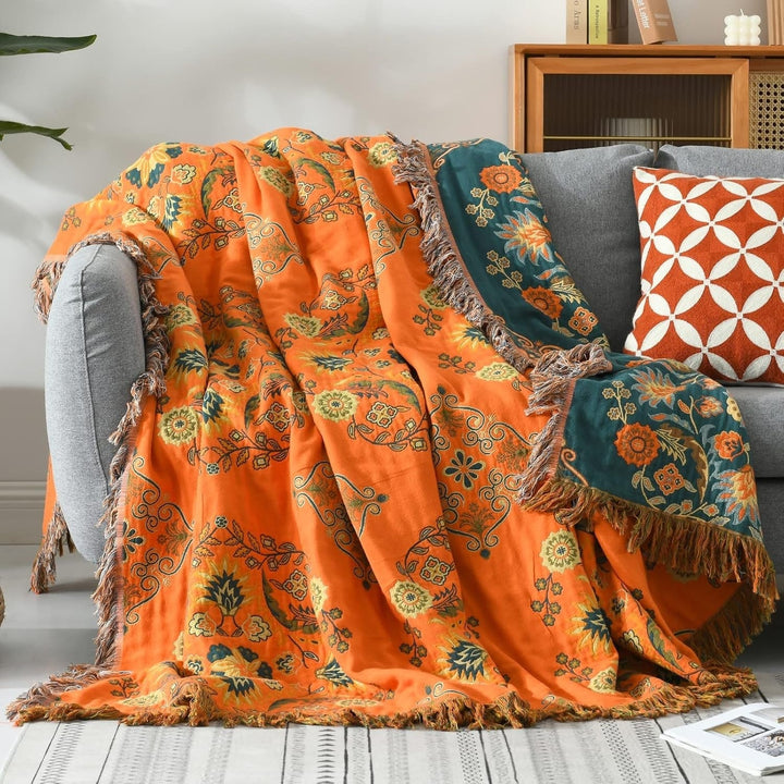 Jeté de lit réversible en coton gaze, motif floral orange/bleu sarcelle, idéal pour une décoration maison.
