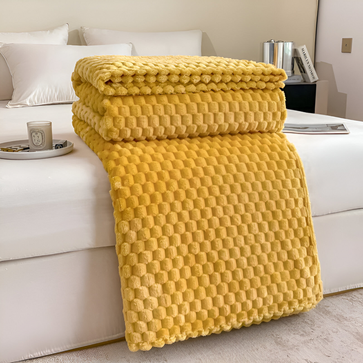 Jeter de canapé en velours polaire, motif géométrique contemporain, doux, chaud et élégant pour votre salon.
