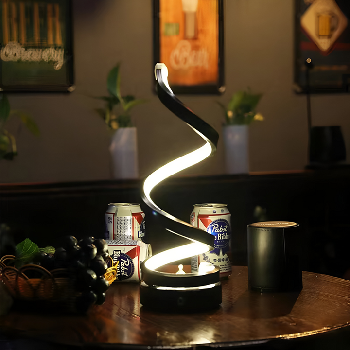 Lampe LED spirale noire, design moderne, parfaite pour bureau, offre 3 types de lumière.