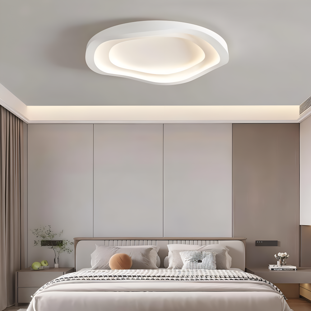 Luminaire LED dimmable, plafonnier blanc courbé pour une ambiance ajustable au salon ou chambre moderne.