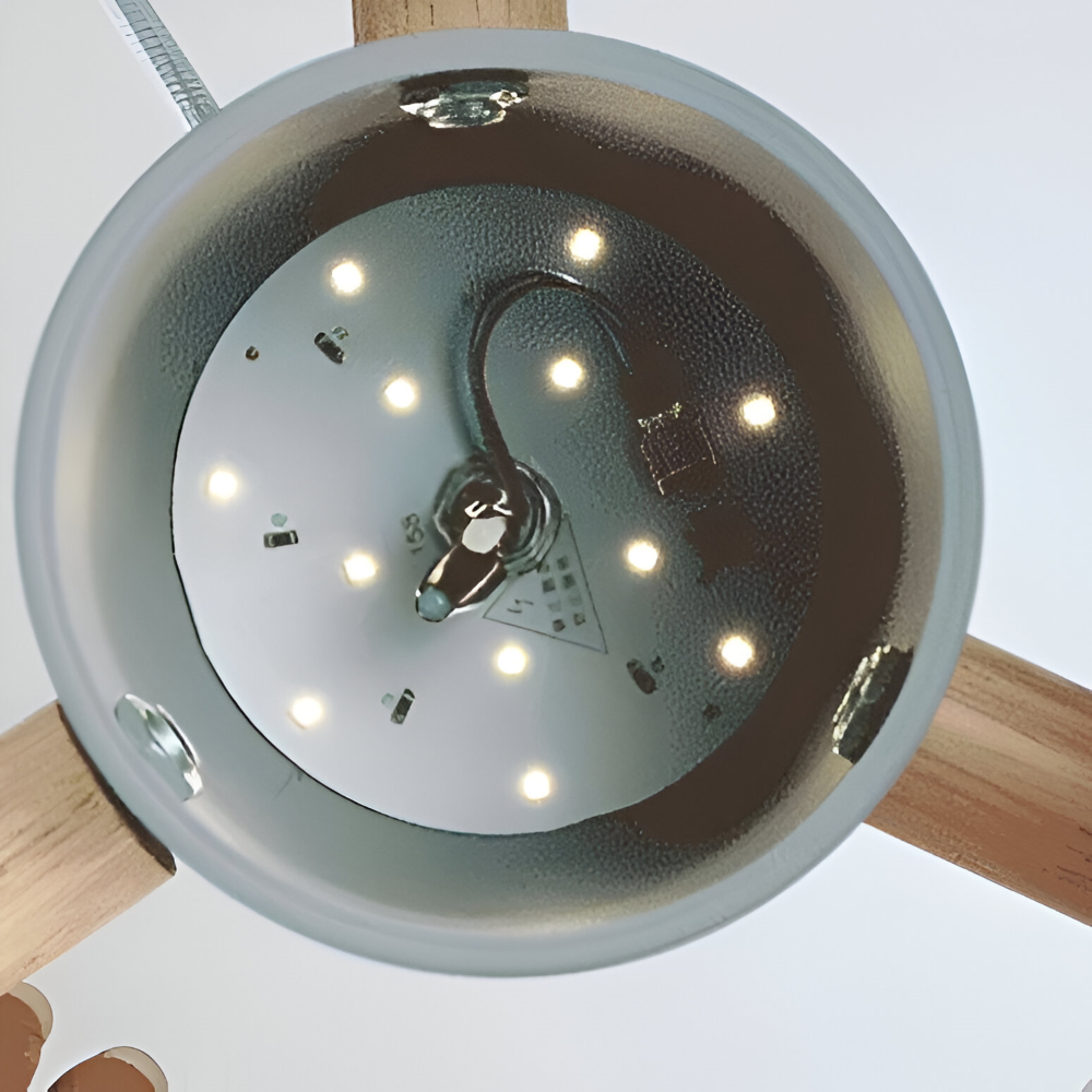 Luminaire suspendu scandinave cuivré, touche industrielle moderne et éclairage chaleureux.