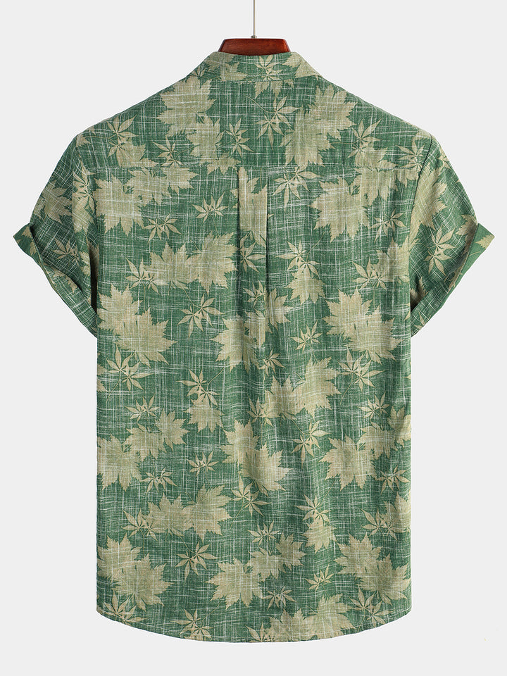 Chemise boutonnée homme, manches courtes, imprimé tropical coloré, style décontracté estival.