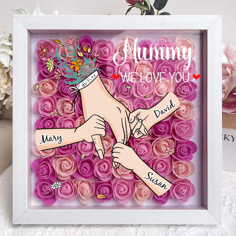 Cadre photo personnalisé avec motif floral, noms et message pour Maman. Idéal comme cadeau souvenir.