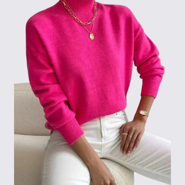 Pull femme à col montant, dos élégant, coupe ample et confortable, parfait pour la mode féminine d'hiver.