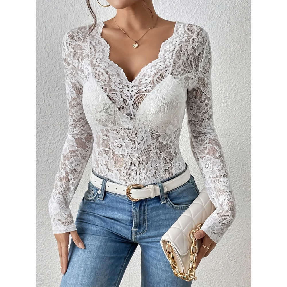 Haut chic sophistiqué femme à col V et manches longues. Le design ajouré ajoute une touche mode féminine.