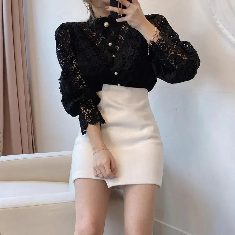 Chemisier chic pour femme avec détails raffinés et manches longues, pour une allure mode, élégante et féminine.