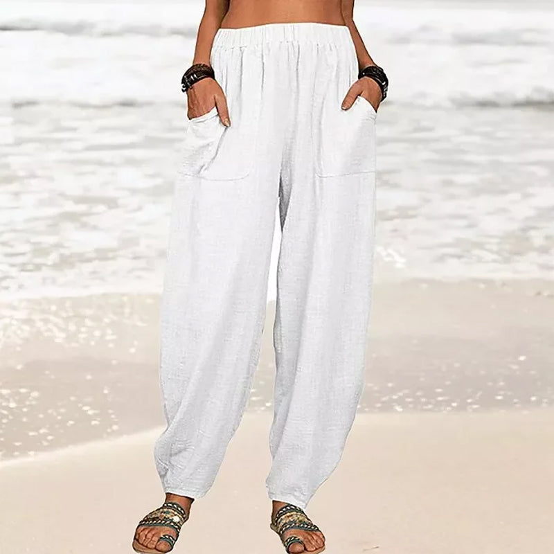 Pantalon harem femme fluide et confortable couleur unie, idéal pour le quotidien ou les loisirs.