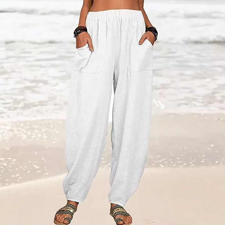 Pantalon harem femme fluide et confortable couleur unie, idéal pour le quotidien ou les loisirs.
