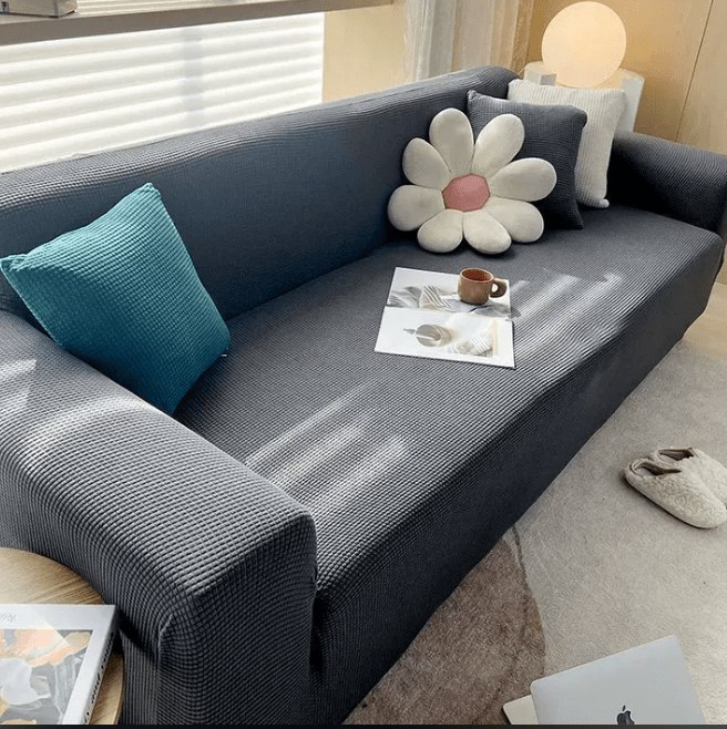 Housse de canapé antidérapante COUCHWRAP en tissu jacquard, protège et décore votre salon avec élégance et confort.