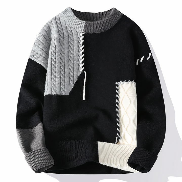 Pull homme casual chic avec motifs patchwork variés, idéal pour un look automne-hiver décontracté et stylé.