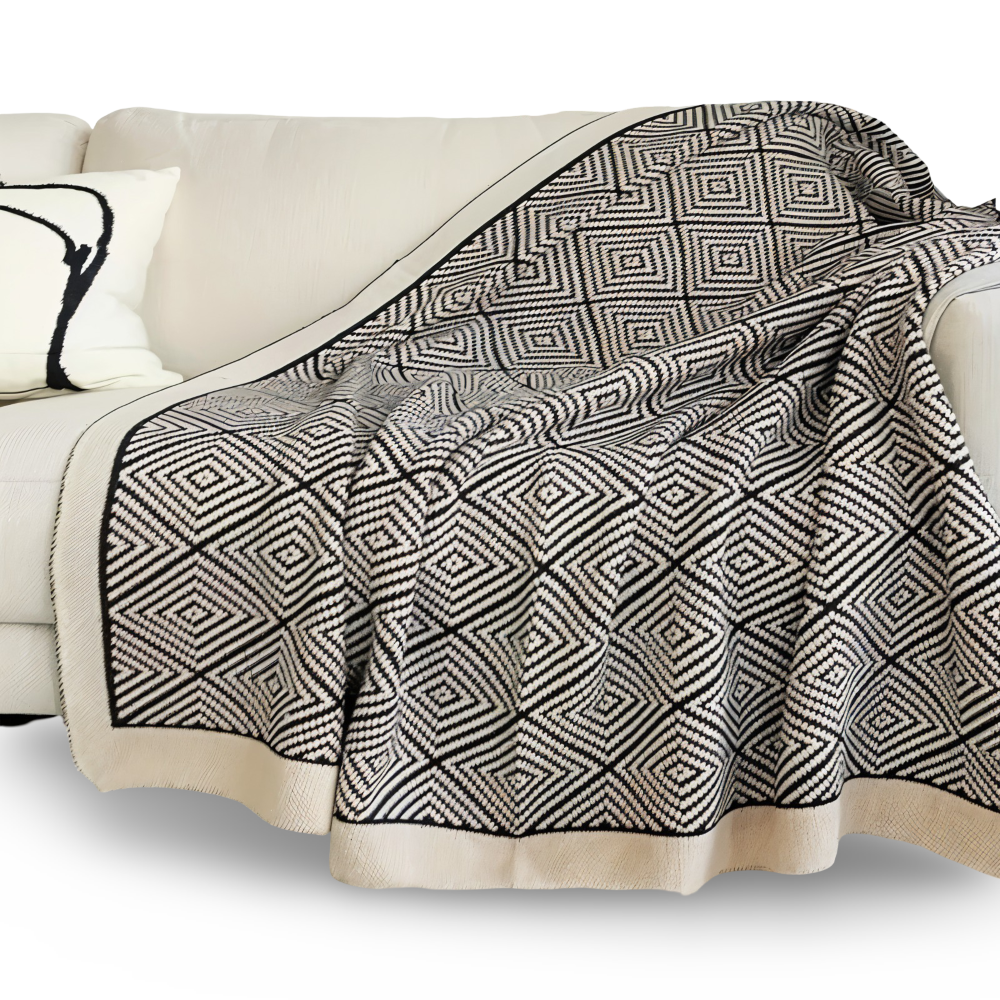 Couverture douce et légère noir & blanc, motif géométrique, pour ajouter du style à votre lit ou canapé.