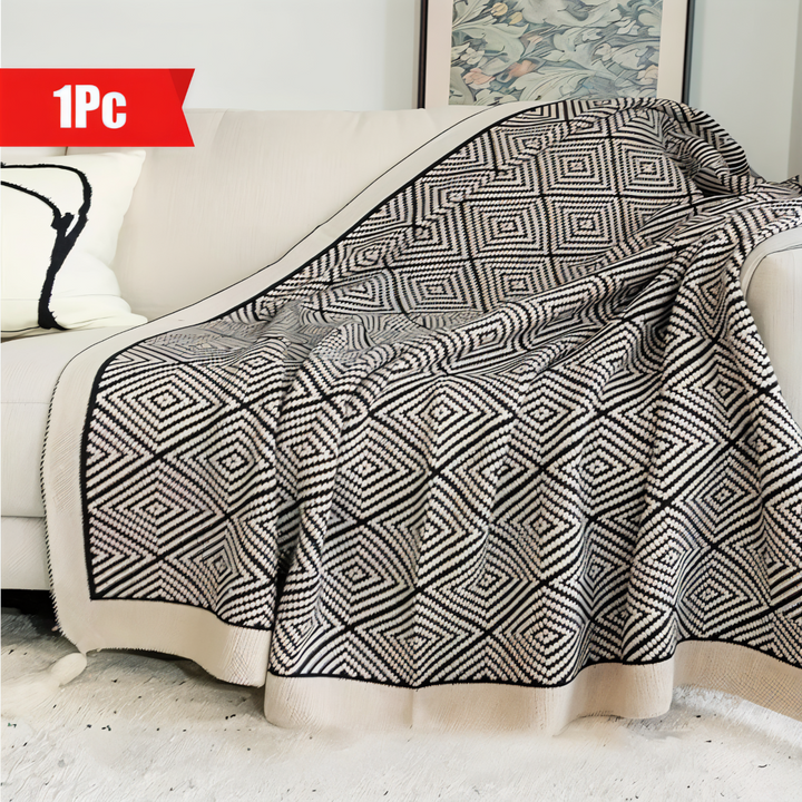 Plaid moderne noir & blanc à motifs géométriques, en polaire douce, parfait pour intérieur cocooning.