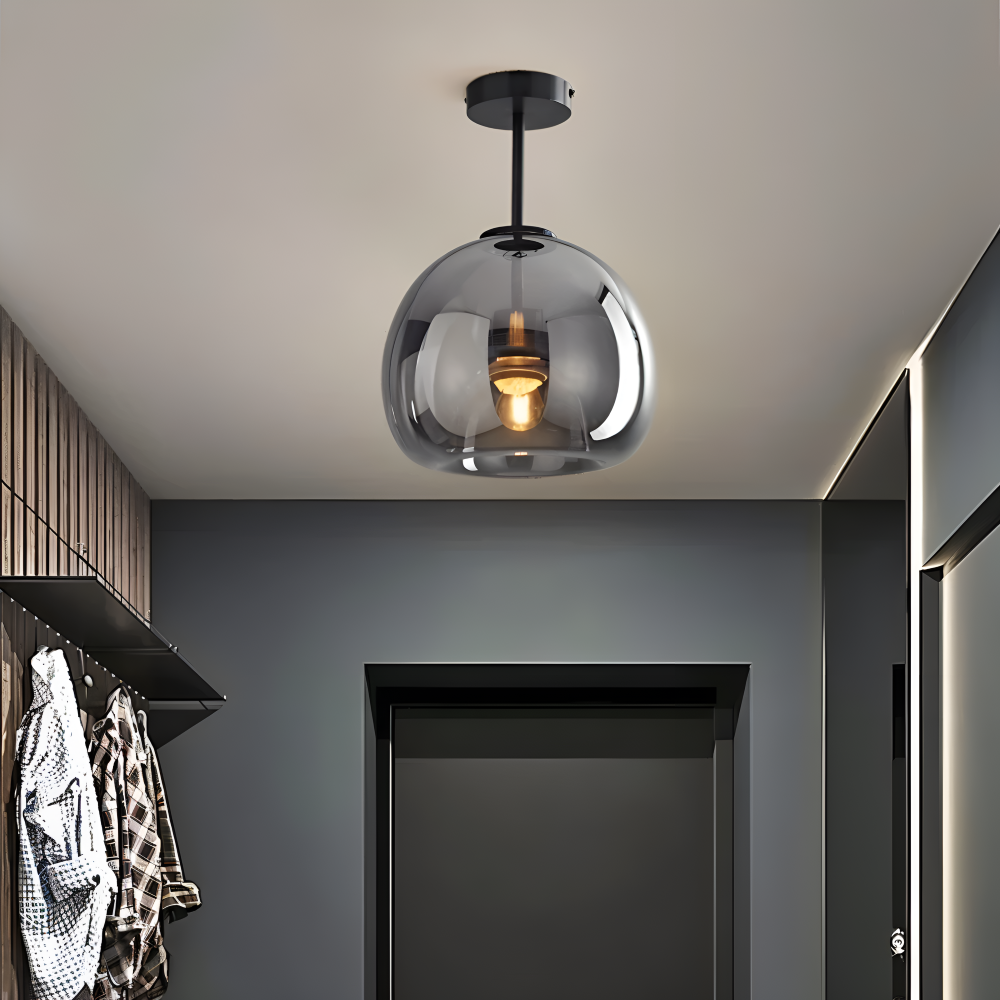 Luminaire LED rond noir et or. Éclairage design pour décoration maison.