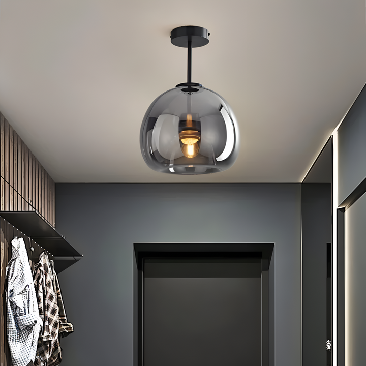 Luminaire LED rond noir et or. Éclairage design pour décoration maison.