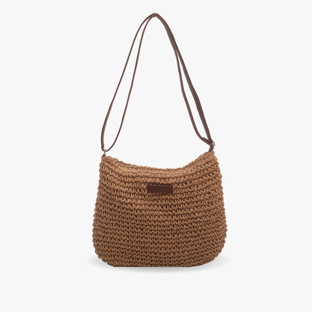 Sac bohème chic en paille, bandoulière femme, idéal pour compléter vos tenues estivales.