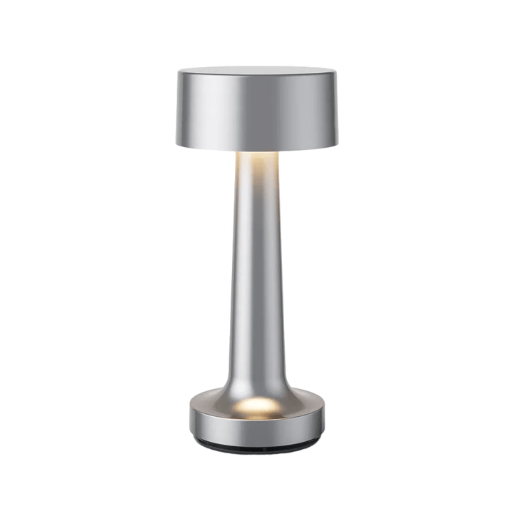Lampe de table LED rechargeable, sans fil, dimmable, parfaite pour créer une ambiance dans un café.