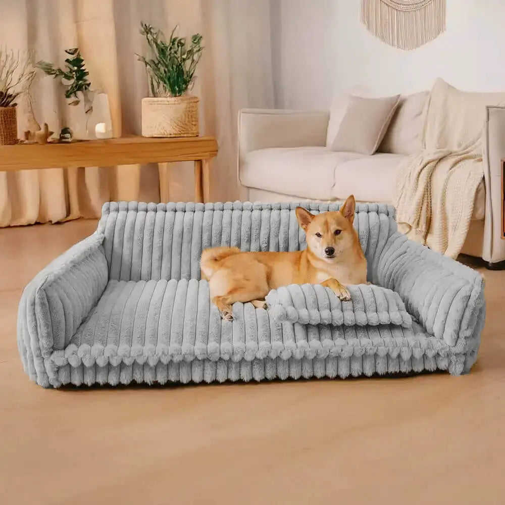 Détail du tissu en velours côtelé doux et résistant du lit pour chien, idéal pour un repos douillet.