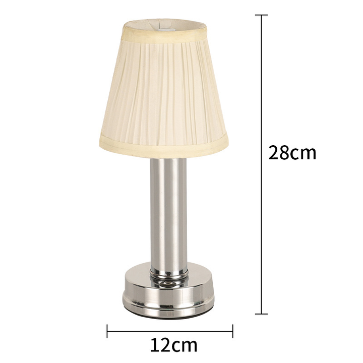 Lampe de table LED sans fil rechargeable, design moderne, lumière dimmable, idéale pour un éclairage d'ambiance luxueux.