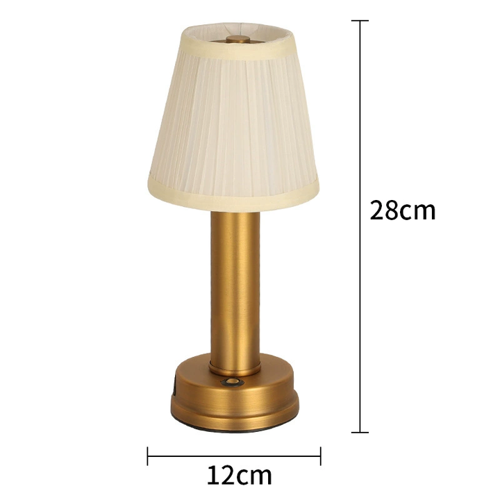 Lampe de table LED portable, sans fil, dimmable, avec une lumière douce pour une ambiance élégante et un design moderne.