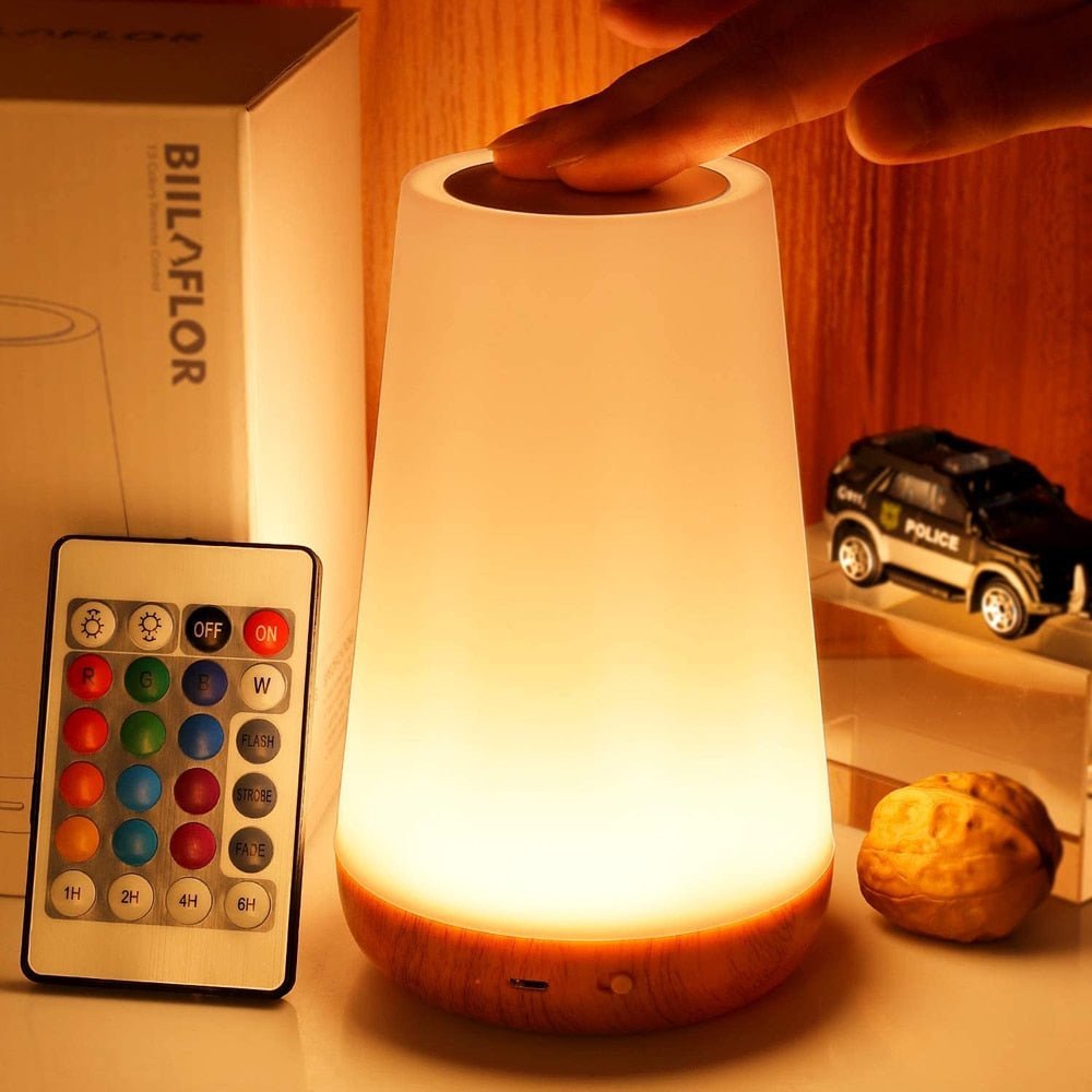 Lampe de table LED tactile et dimmable portable, design moderne, rechargeable pour éclairage sans fil.