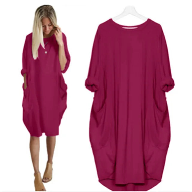 Robe midi oversize femme, manches longues, allie élégance décontractée et grand confort.