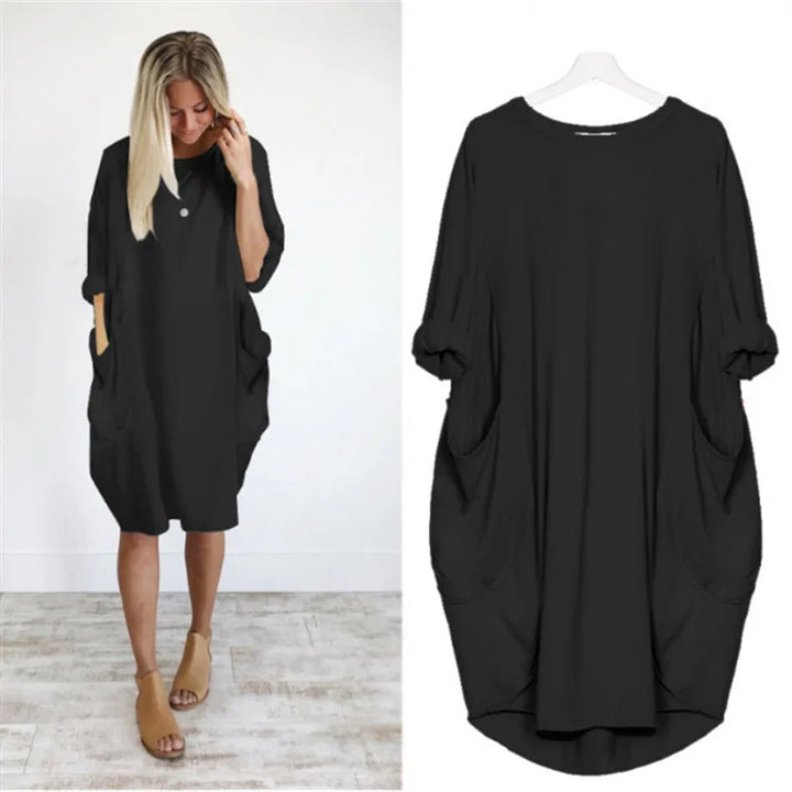 Robe chic midi oversize, manches longues, parfaite pour un confort élégant.