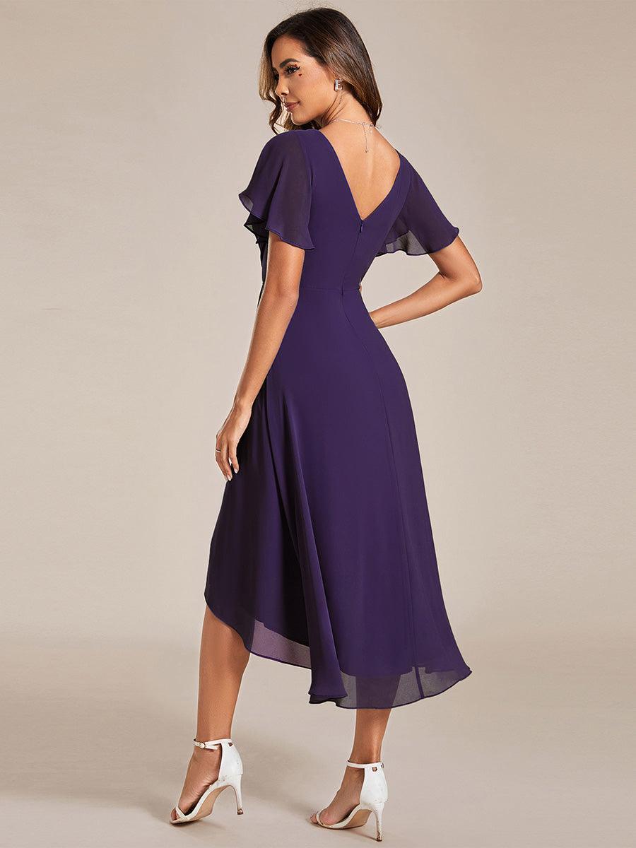 Élégante robe longue fluide, col V profond, pour cérémonie femme.