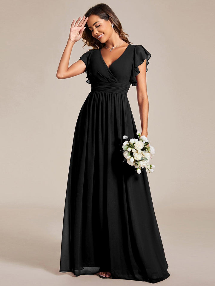 Robe de fête élégante, dos ouvert, manches courtes. Fluide et longue pour l'été.