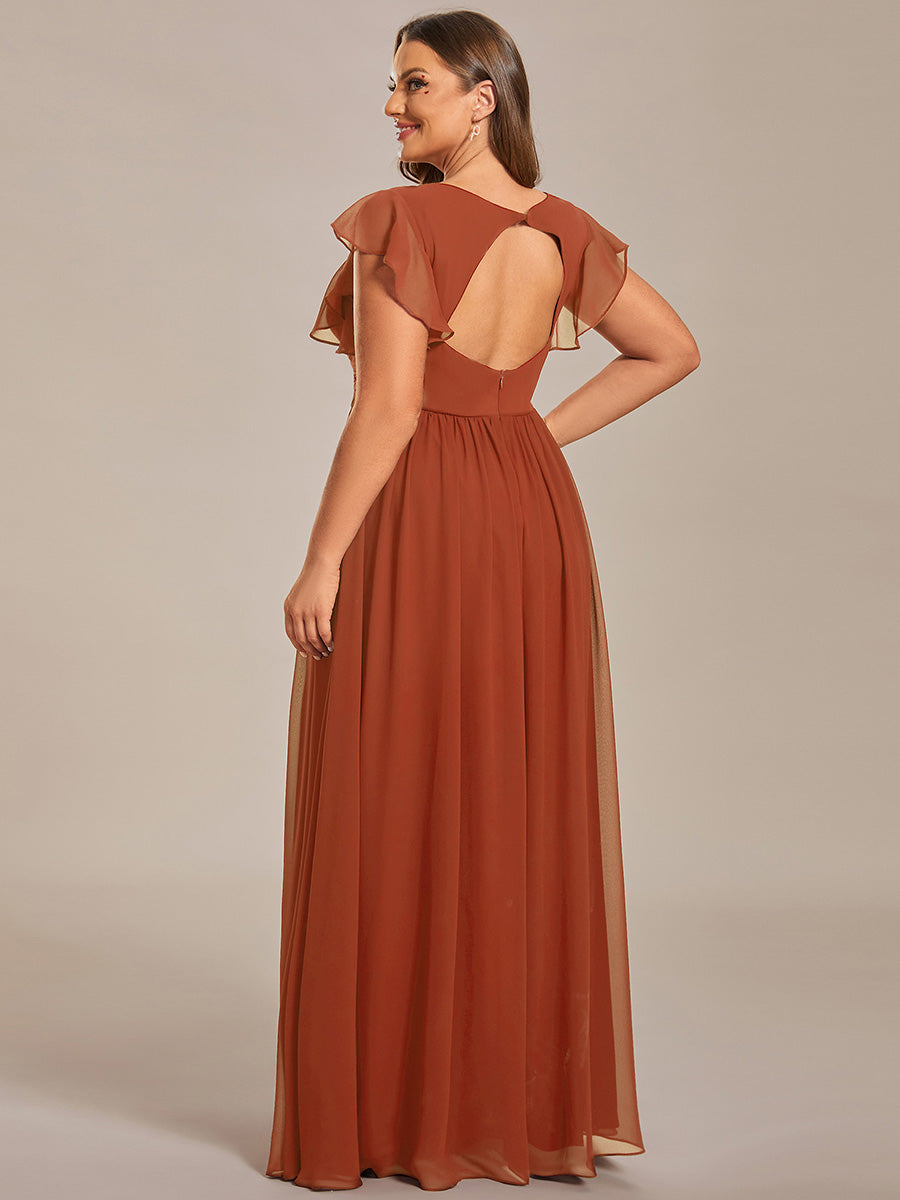 Robe de cérémonie femme, longue et fluide, col en V. Un choix élégant pour une demoiselle d'honneur.