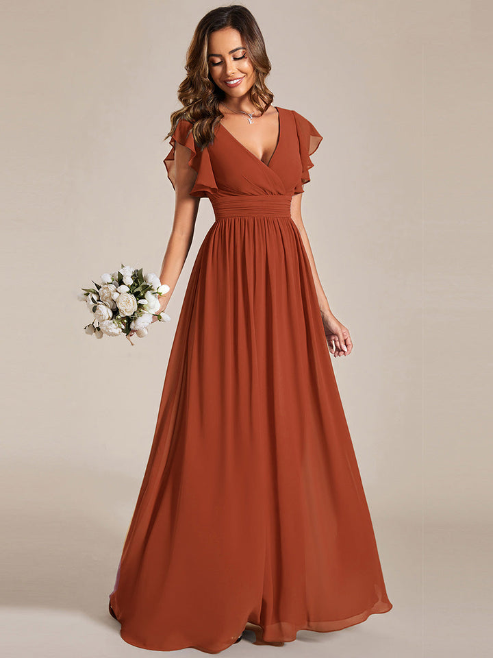 Robe fluide élégante, dos ouvert, longueur maxi. Idéale pour demoiselle d'honneur et mariage.