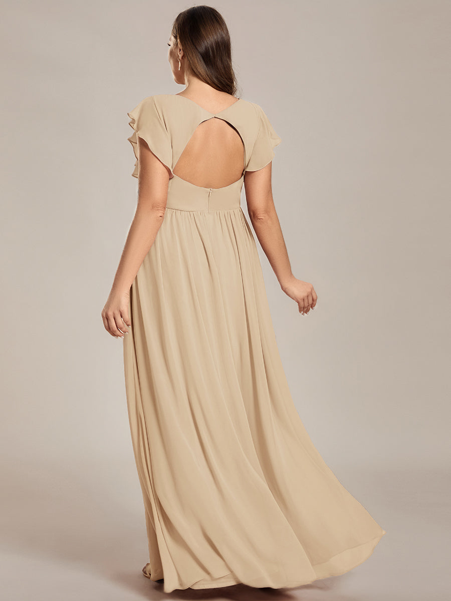 Robe longue femme, dos ouvert, col en V. Élégante pour une cérémonie ou soirée de printemps.