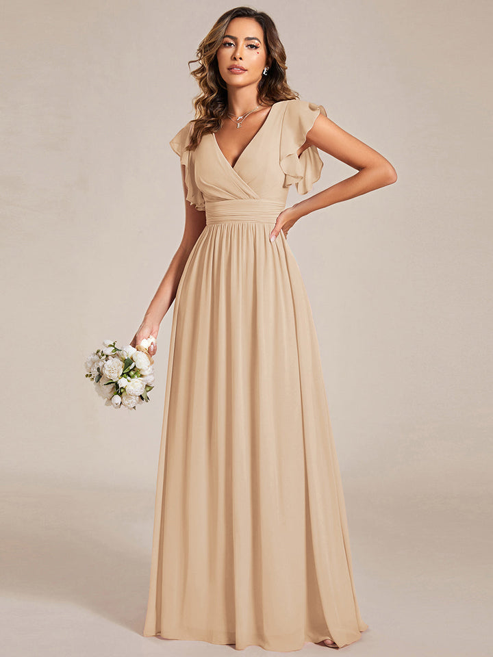 Robe longue femme, dos ouvert, manches courtes. Élégante pour cérémonie ou soirée d'été chic.