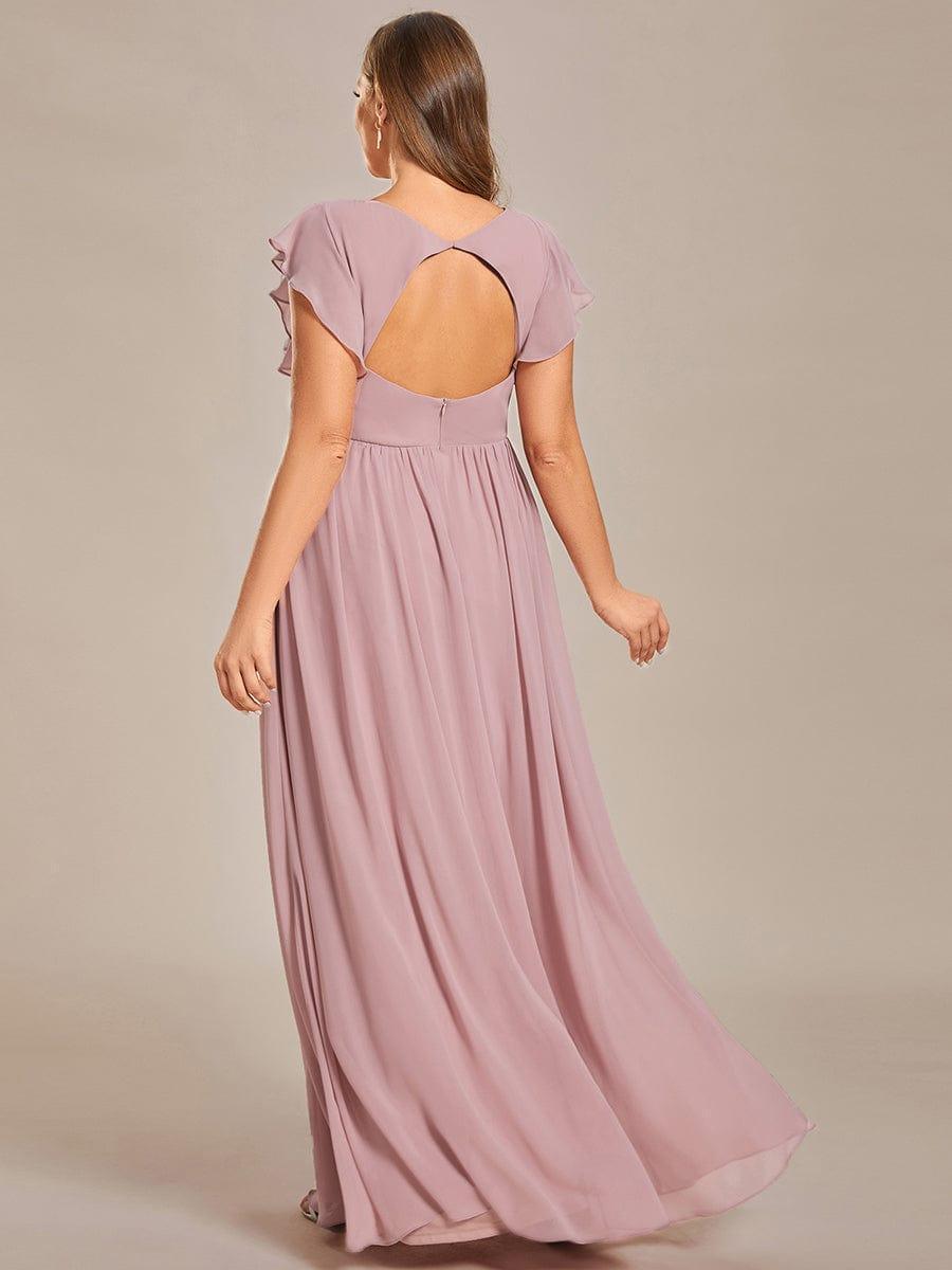 Robe longue fluide, dos ouvert, pour demoiselle d'honneur. Élégante et parfaite pour un mariage.