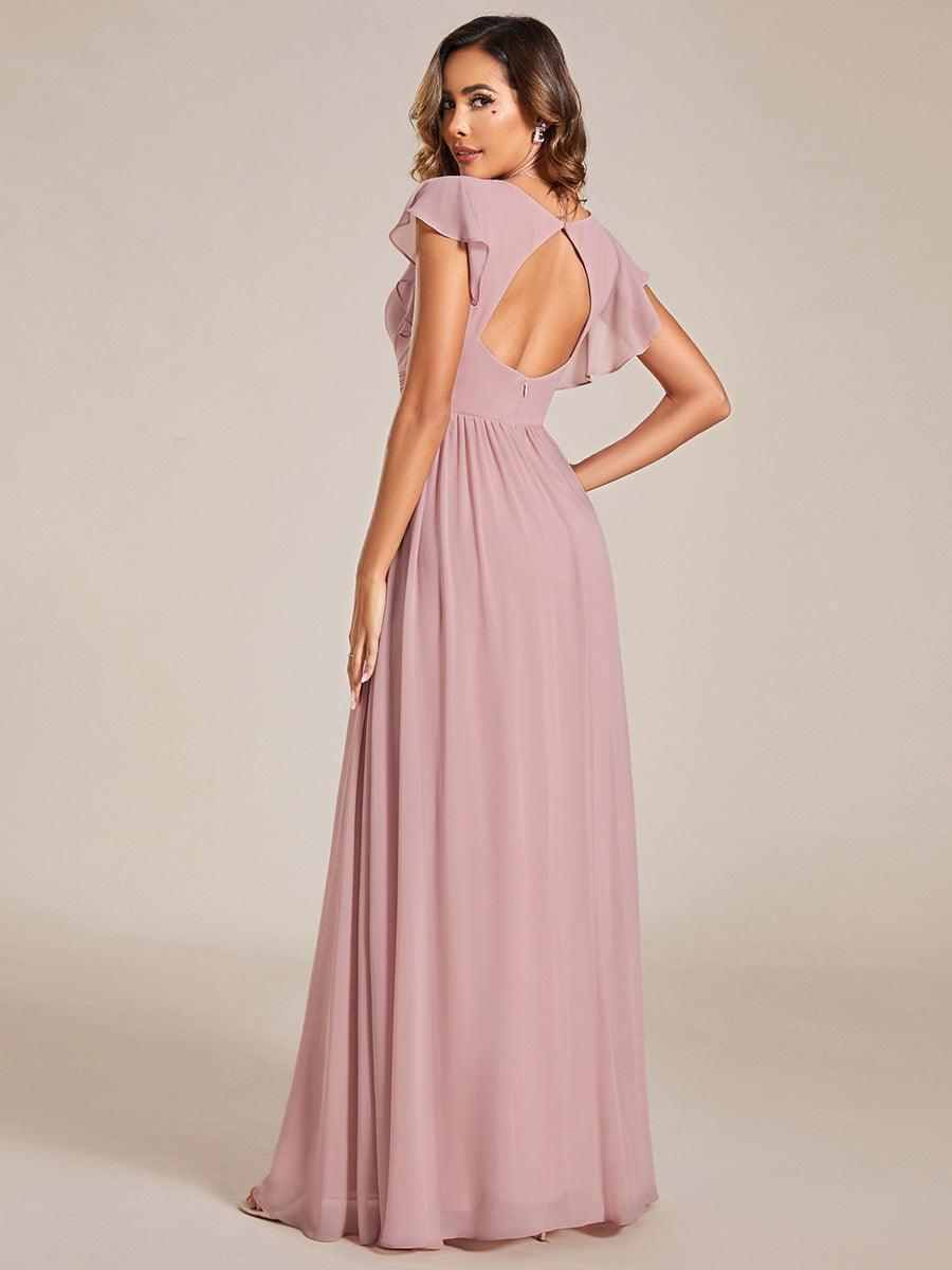 Robe de soirée femme, fluide et maxi, avec dos ouvert. Parfaite pour une fête d'été élégante.