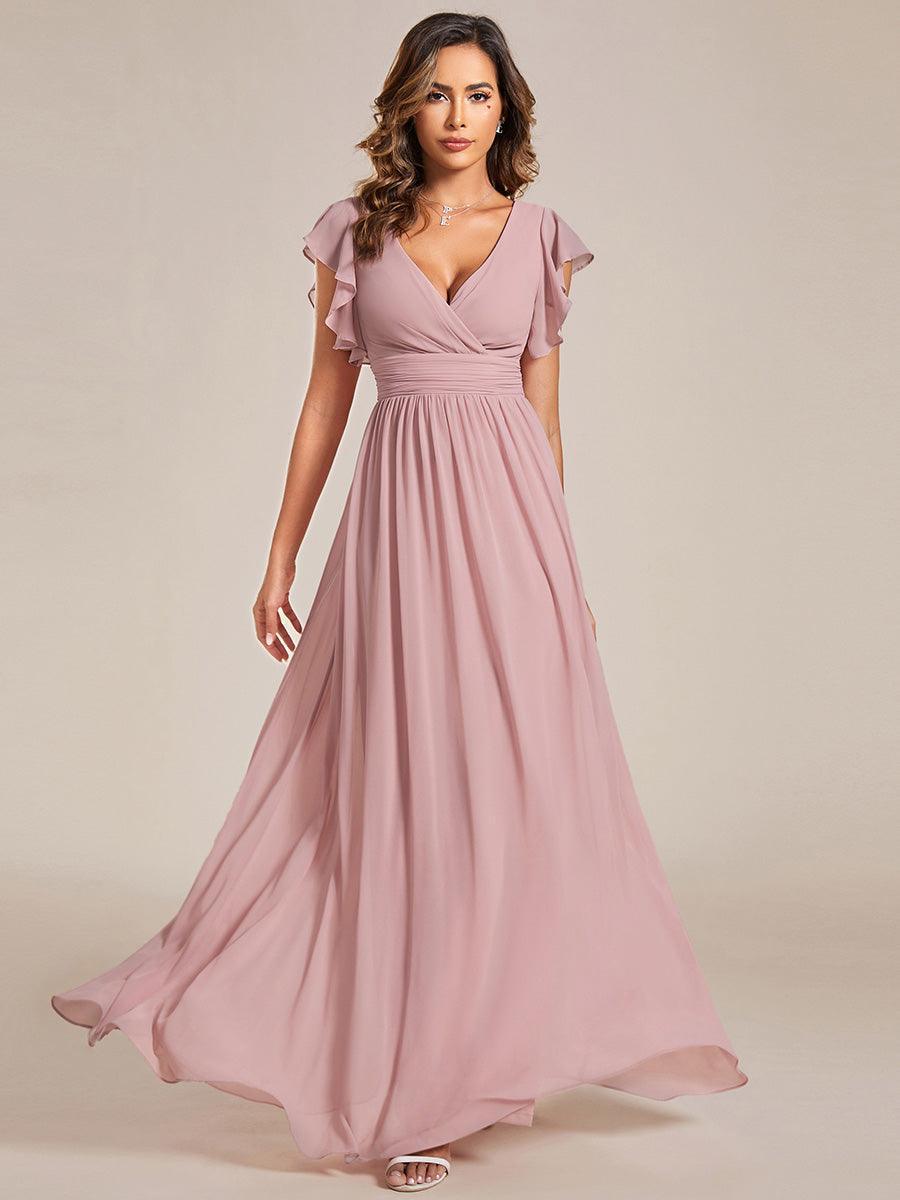 Robe longue femme, dos ouvert, col en V, élégante et fluide. Idéale pour les grandes occasions.