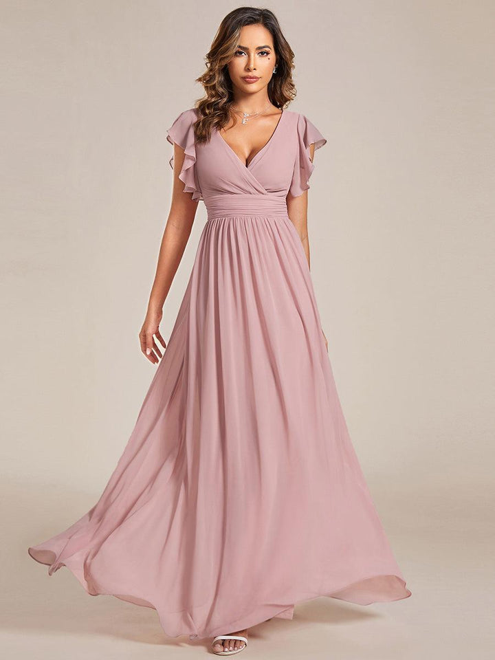 Robe longue femme, dos ouvert, col en V, élégante et fluide. Idéale pour les grandes occasions.